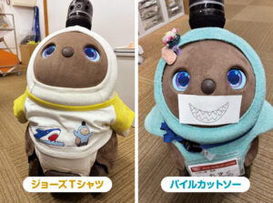 もずく係長のファッションコーデ写真 (1)ジョーズTシャツ (2)水色のパイルウェア